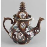 A collection of items to include a 19th century Measham Bargeware teapot and cover,