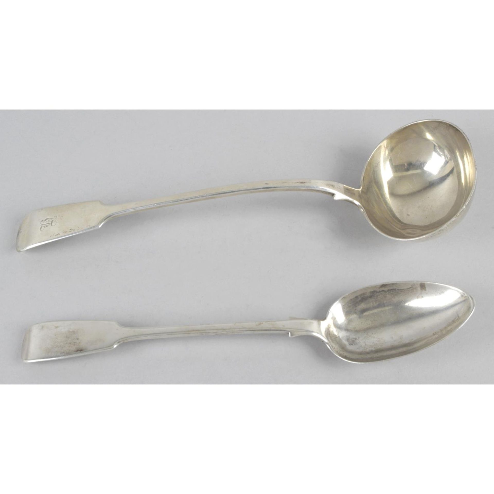 An early Victorian silver Fiddle pattern soup ladle,