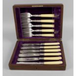 An Edwardian part set of fish knives and forks for six table settings,