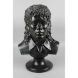 A bronze head and shoulder bust modelled as Michael Jackson,
