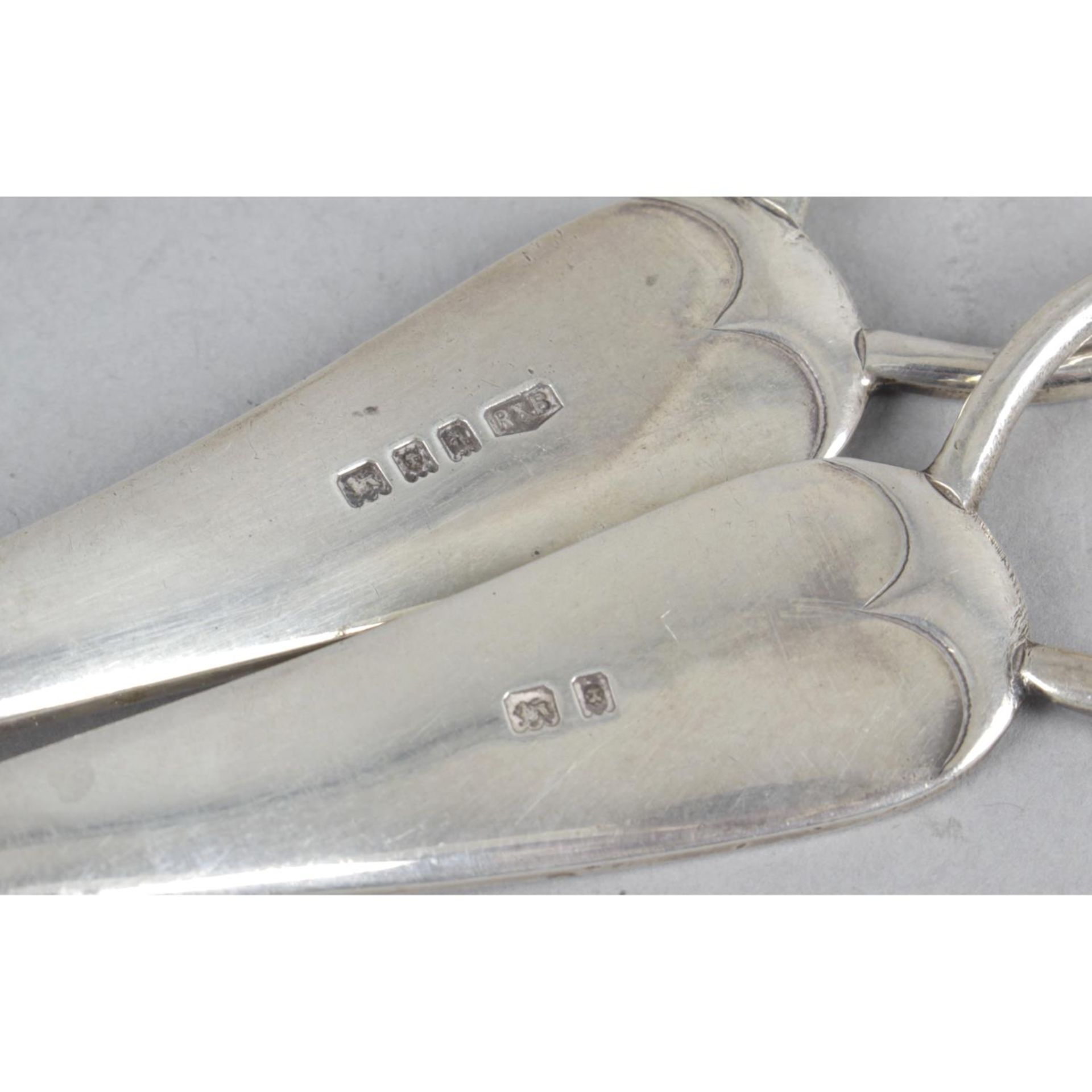 An Edwardian silver pair of grape scissors of plain design with loop handles - stamped Rd 483718. - Image 2 of 2
