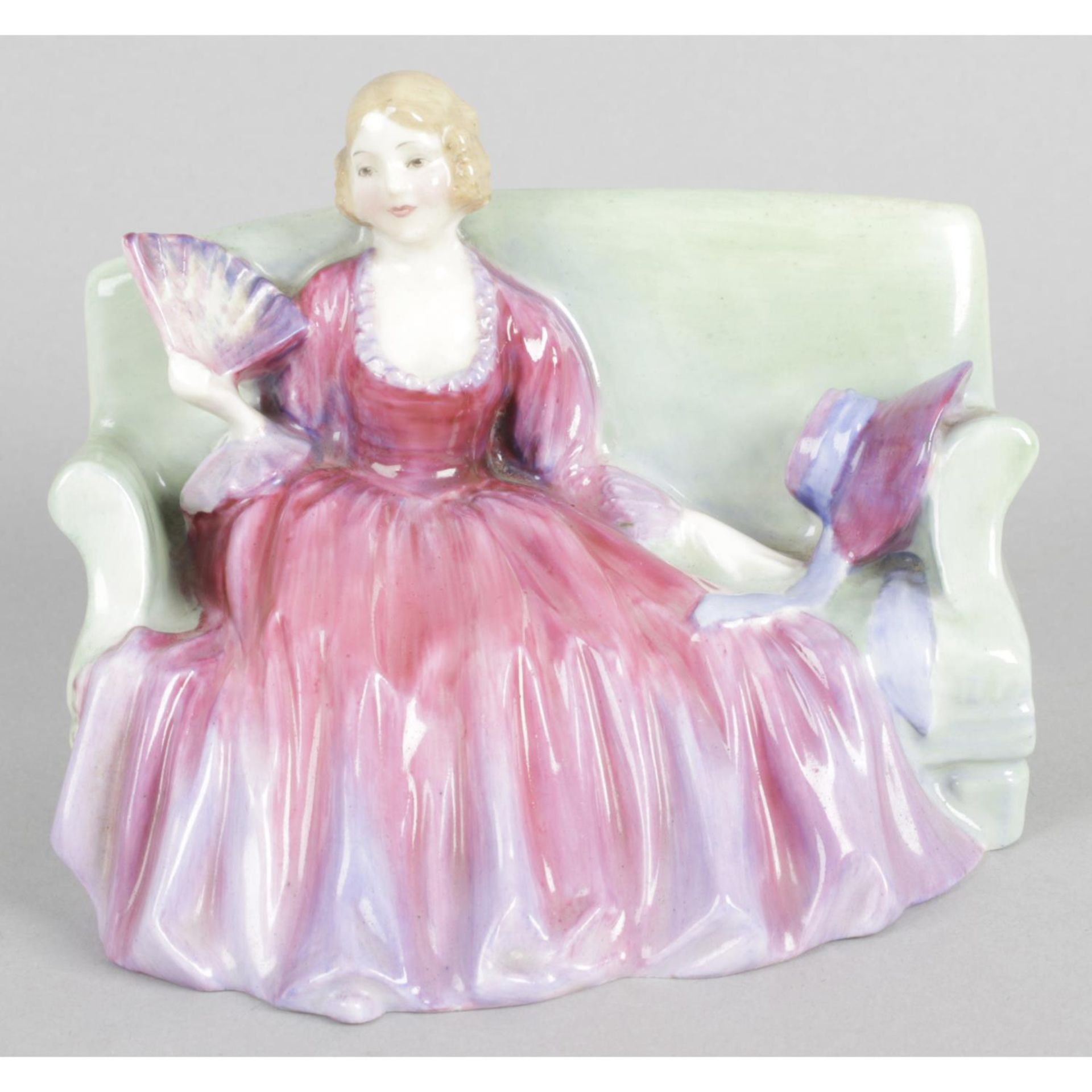 A Royal Doulton figurine entitled 'Sweet and Twenty', HN 1589.