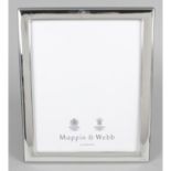 A large silver mounted photograph frame,