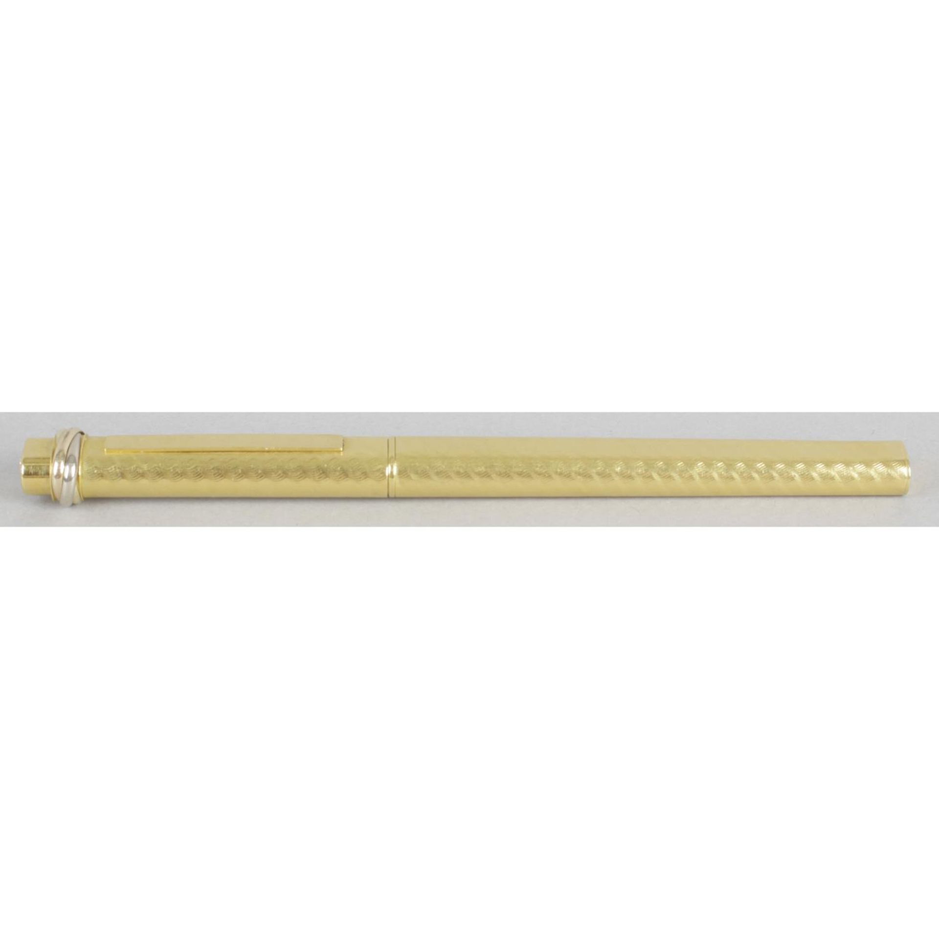 A Must de Cartier gold plated ballpoint pen,