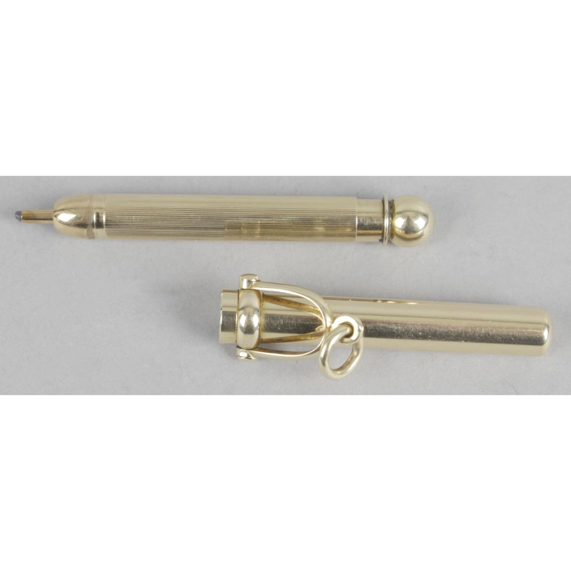 A Sampson Mordan & Co gold telescopic propelling pencil,