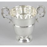 A 1920's silver small cup with twin scroll handles,