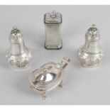 A pair of late Victorian silver pepperettes,