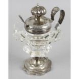 A silver mounted and glass mustard pot,