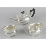 A mid-20th century silver three piece tea set,