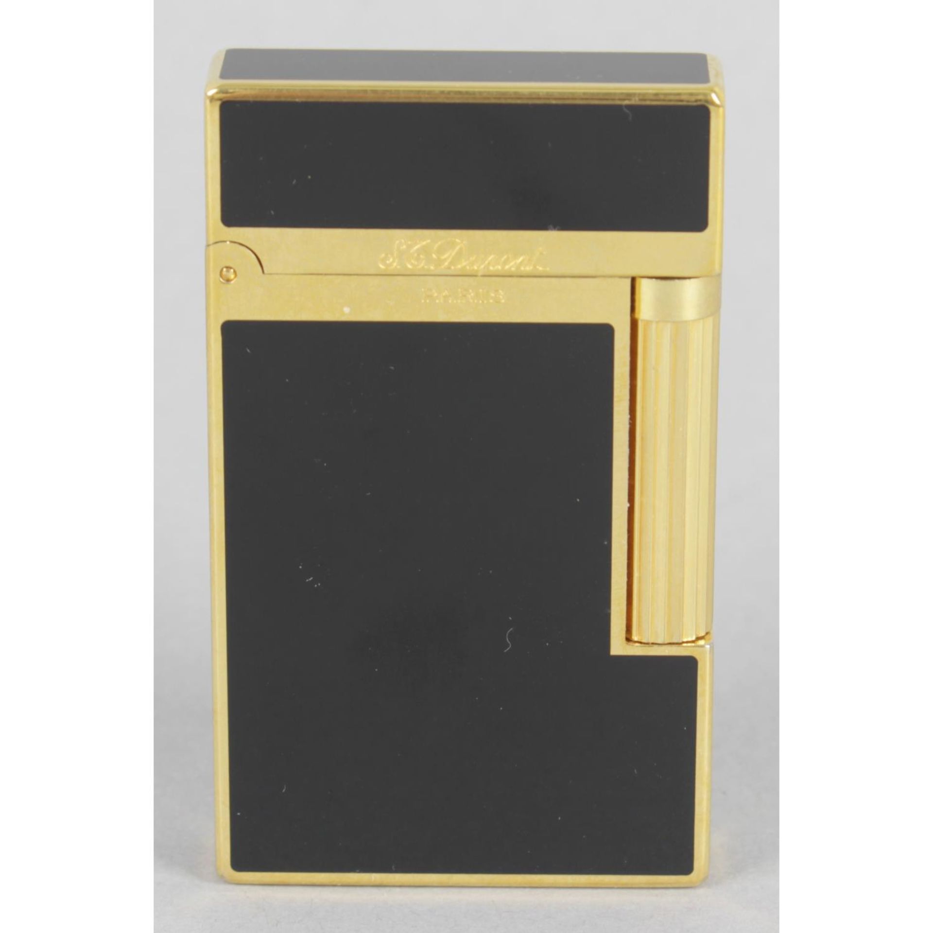 A cased S. T. Dupont lighter,