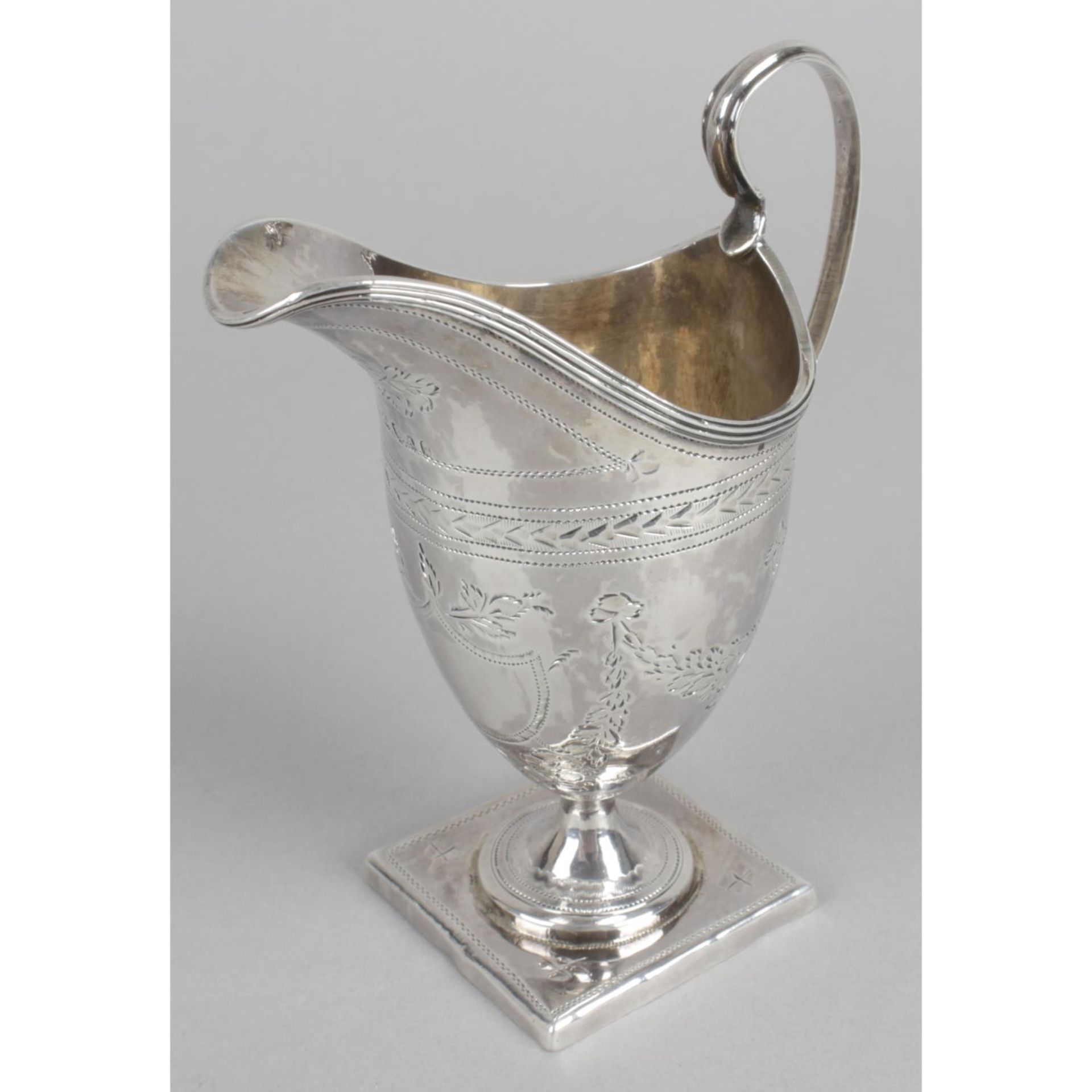 A George III silver cream jug,