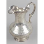 A Victorian silver jug,