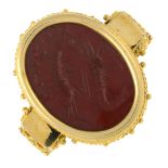 A carved jasper intaglio signet ring, carved to depict two shrimps.Ring size M.