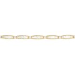 A 9ct gold rectangular and circular-shape cubic zirconia bracelet.