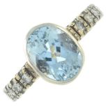 An 18ct gold aquamarine and diamond ring.Aquamarine calculated weight 2.56cts,
