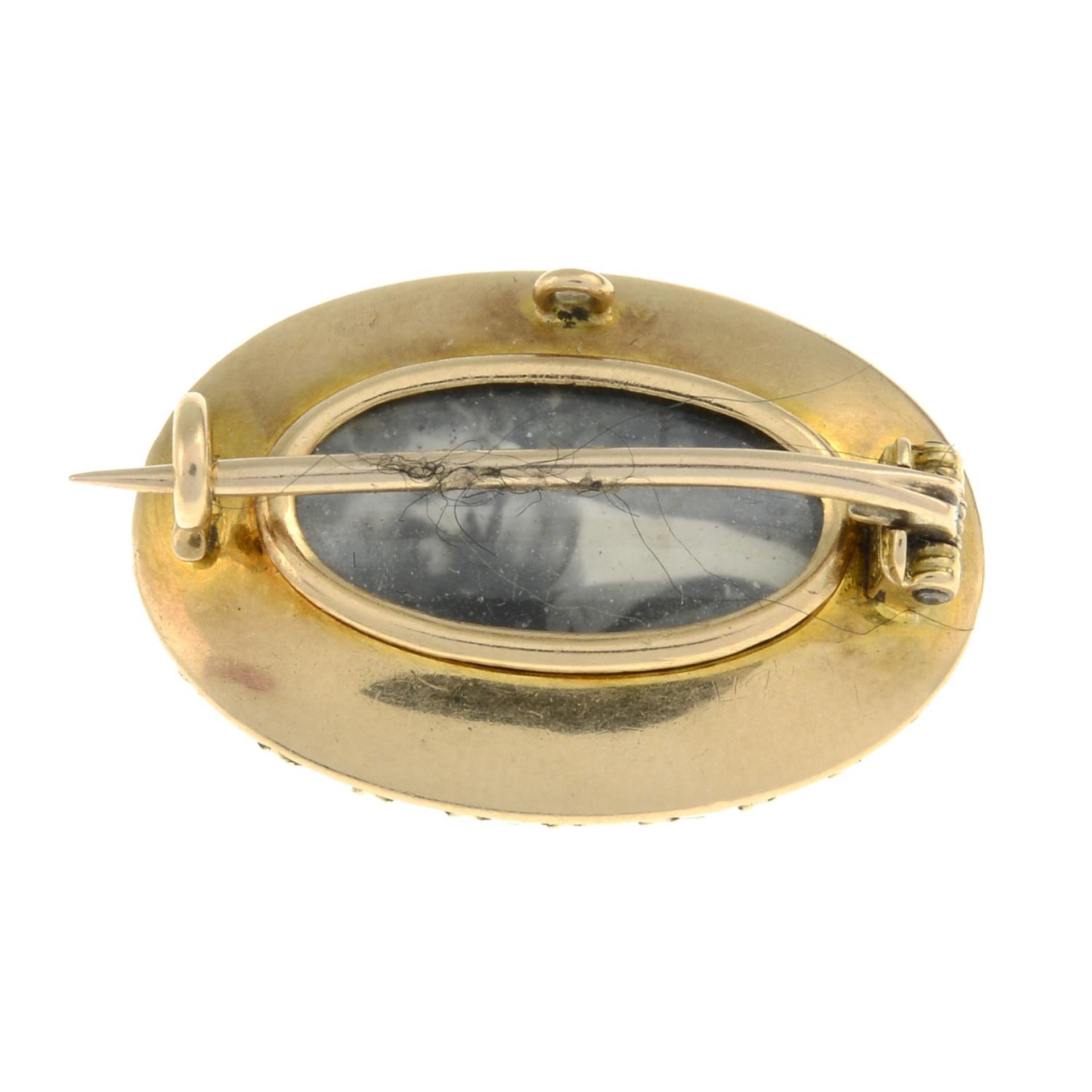 An early 20th century diamond, onyx and split pearl memorial brooch, with glazed reverse. - Bild 2 aus 2