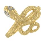 A diamond snake ring.Ring size L, 1.8gms.