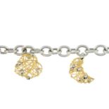 A 9ct gold bi-colour charm bracelet.Hallmarks for Sheffield.Length 19cms.