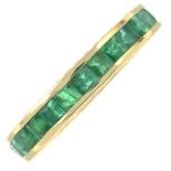 An emerald full eternity ring.Stamped 585.