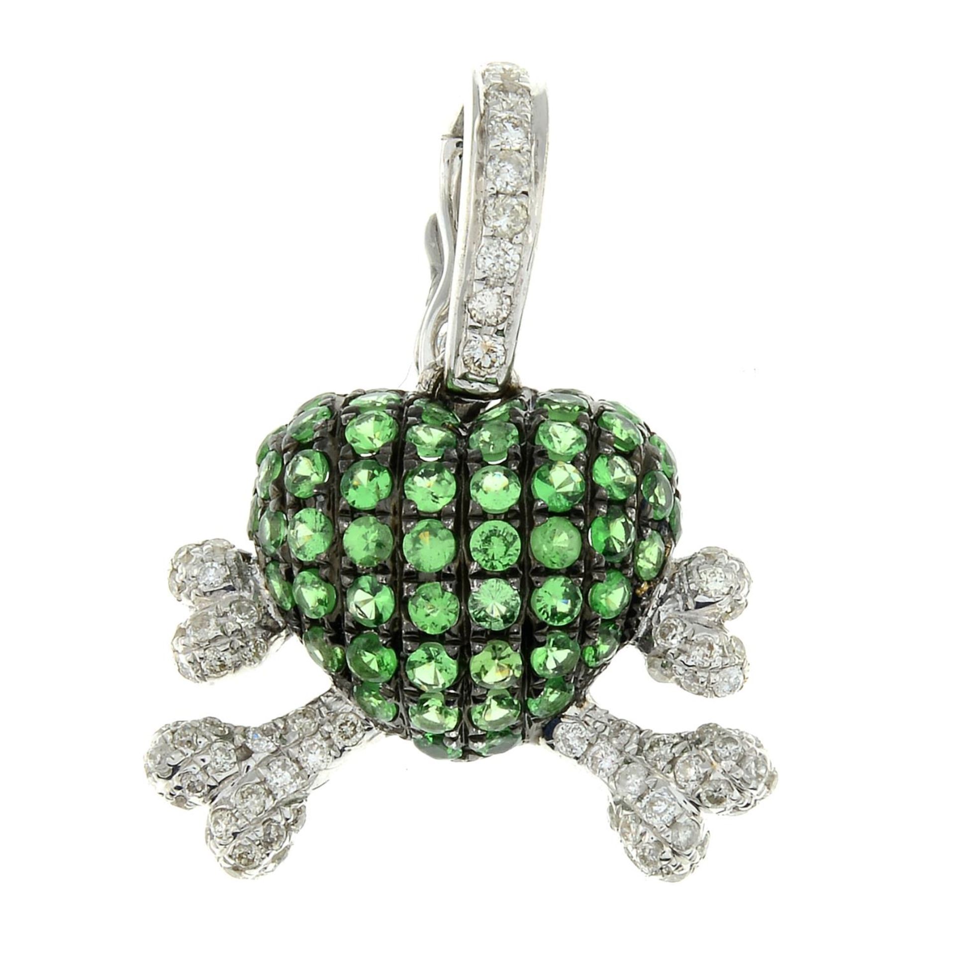 A diamond and green garnet heart and crossbones pendant.Total diamond weight 0.35ct,