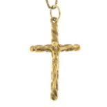 A 9ct gold crucifix pendant with 9ct gold chain.Hallmarks for 9ct gold.