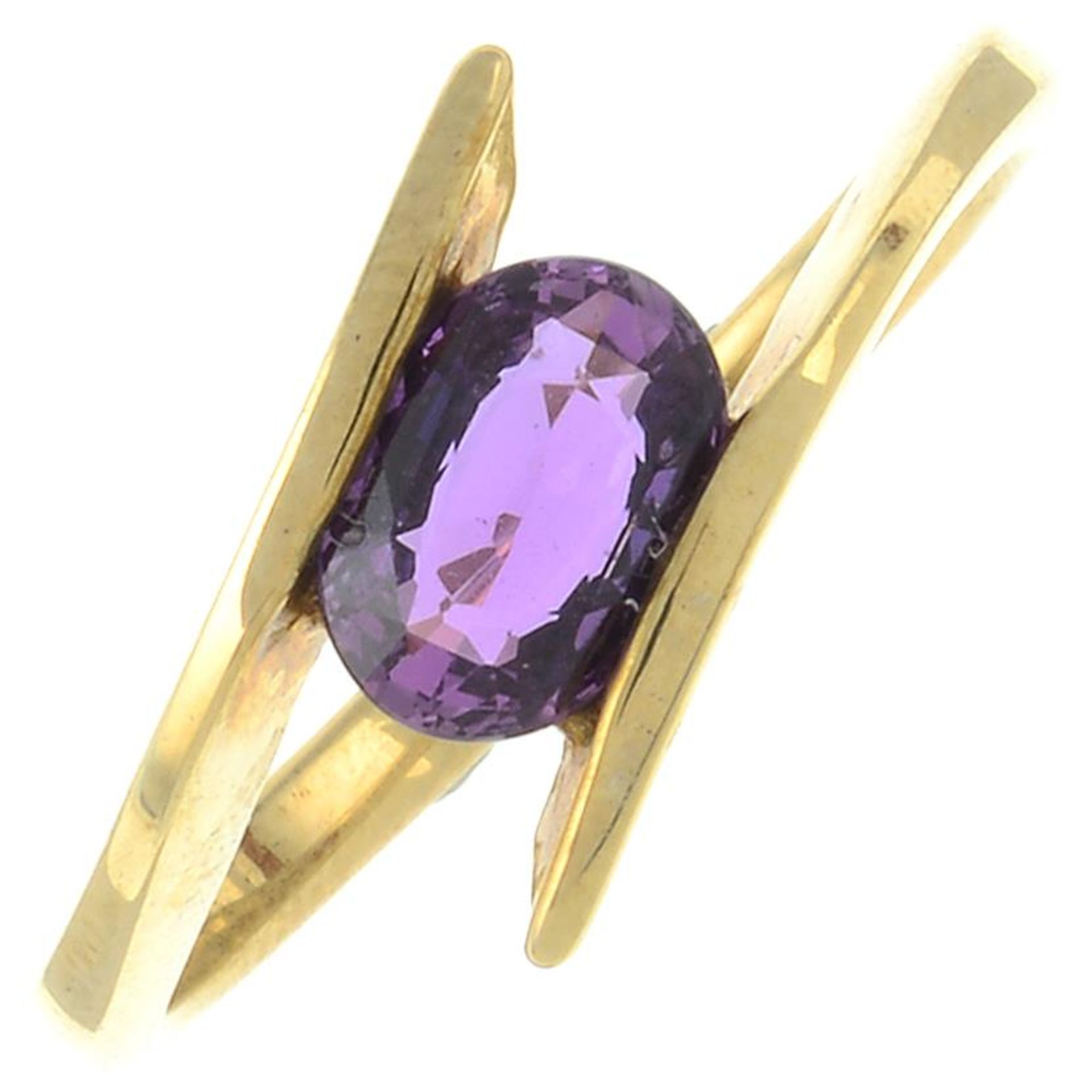 A 9ct gold pink sapphire ring.Hallmarks for 9ct gold.