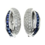A pair of calibre-cut sapphire and pave-set diamond earrings.Estimated total diamond weight 0.30ct.