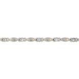 A cubic zirconia line bracelet.