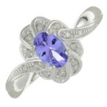 A 9ct gold tanzanite and diamond dress ring.Estimated total diamond weight 0.10ct.