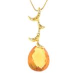 A citrine and diamond pendant, with 18ct gold chain.Chain with hallmarks for 18ct gold.
