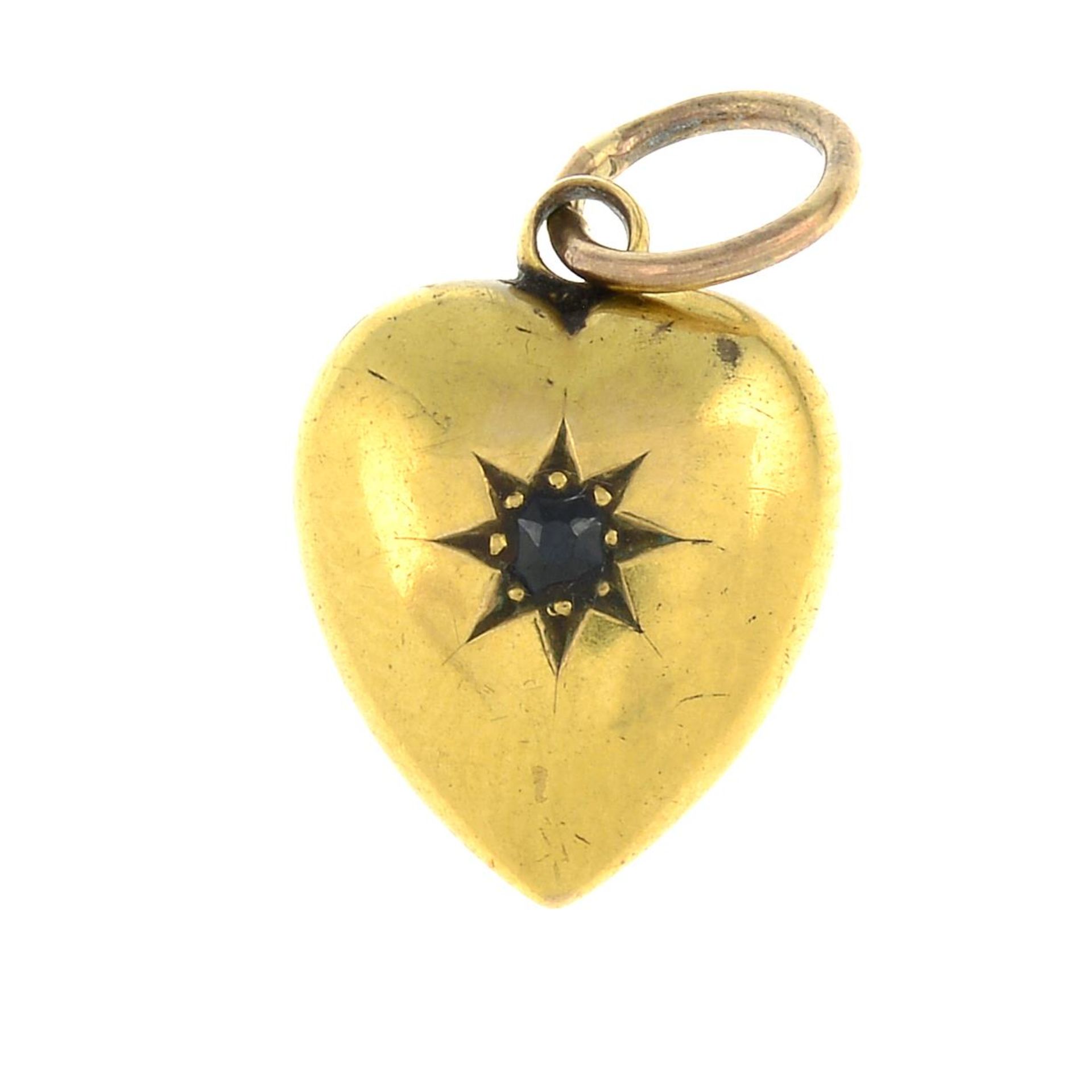 An Edwardian 15ct gold sapphire heart pendant.Maker's marks C&A.Hallmarks for Chester,