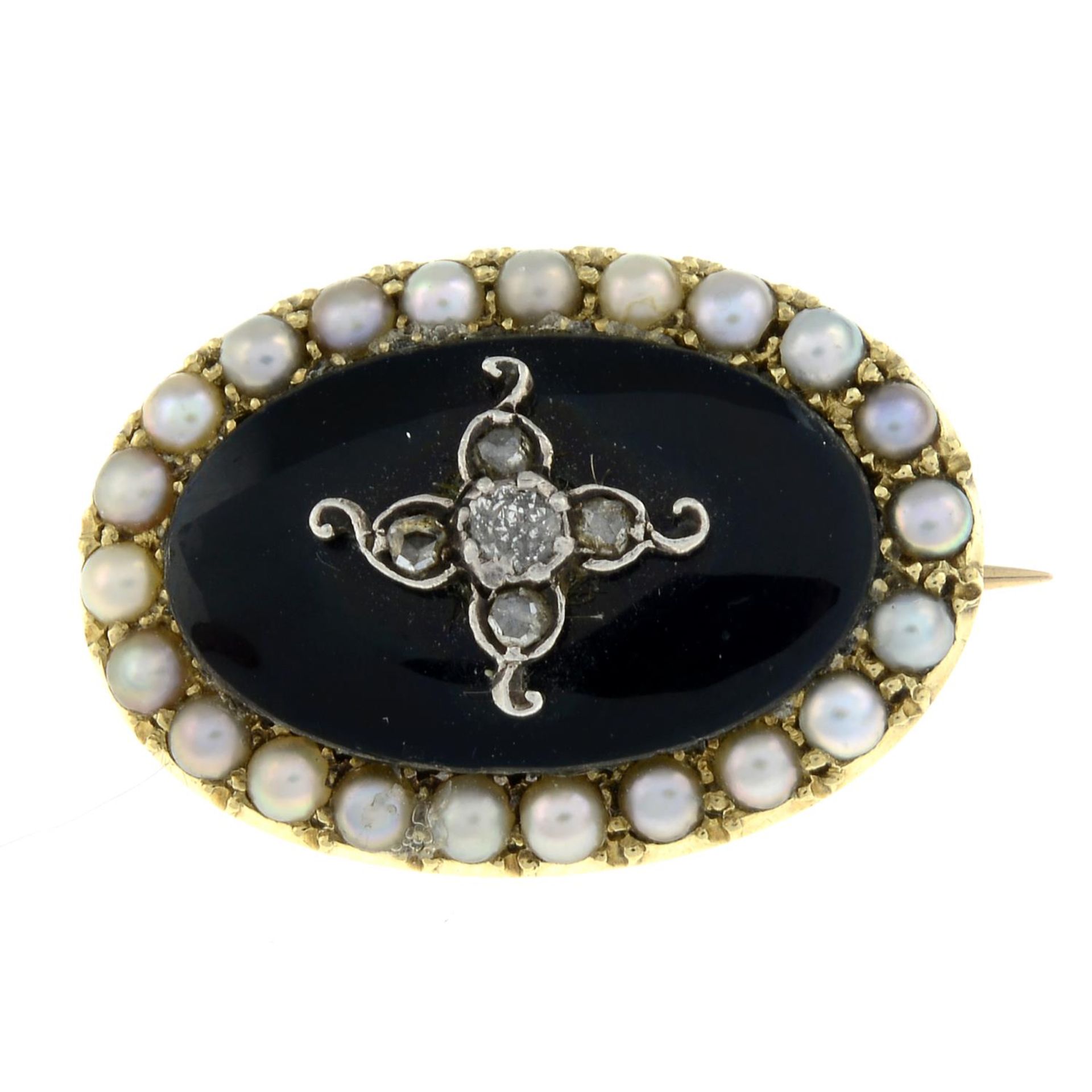 An early 20th century diamond, onyx and split pearl memorial brooch, with glazed reverse.