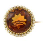 A citrine and split pearl brooch.Citrine calculated weight 22.53cts,