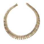 A 9ct gold textured tri-colour necklace.Hallmarks for 9ct gold.