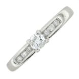 A platinum diamond ring.Total diamond weight 0.25ct, stamped to band.