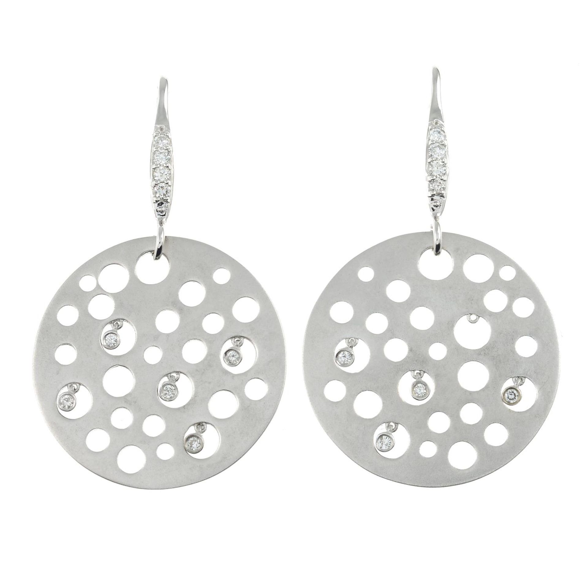 A pair of 18ct gold diamond disc drop earrings.One diamond deficient.
