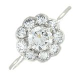 A brilliant-cut diamond cluster ring.Estimated total diamond weight 0.70ct,