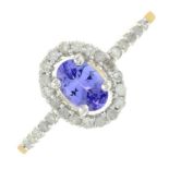 A 9ct gold tanzanite and diamond cluster ring.Estimated total diamond weight 0.25ct.