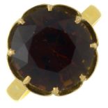 A brown tourmaline single-stone ring.Tourmaline with report 0024129,