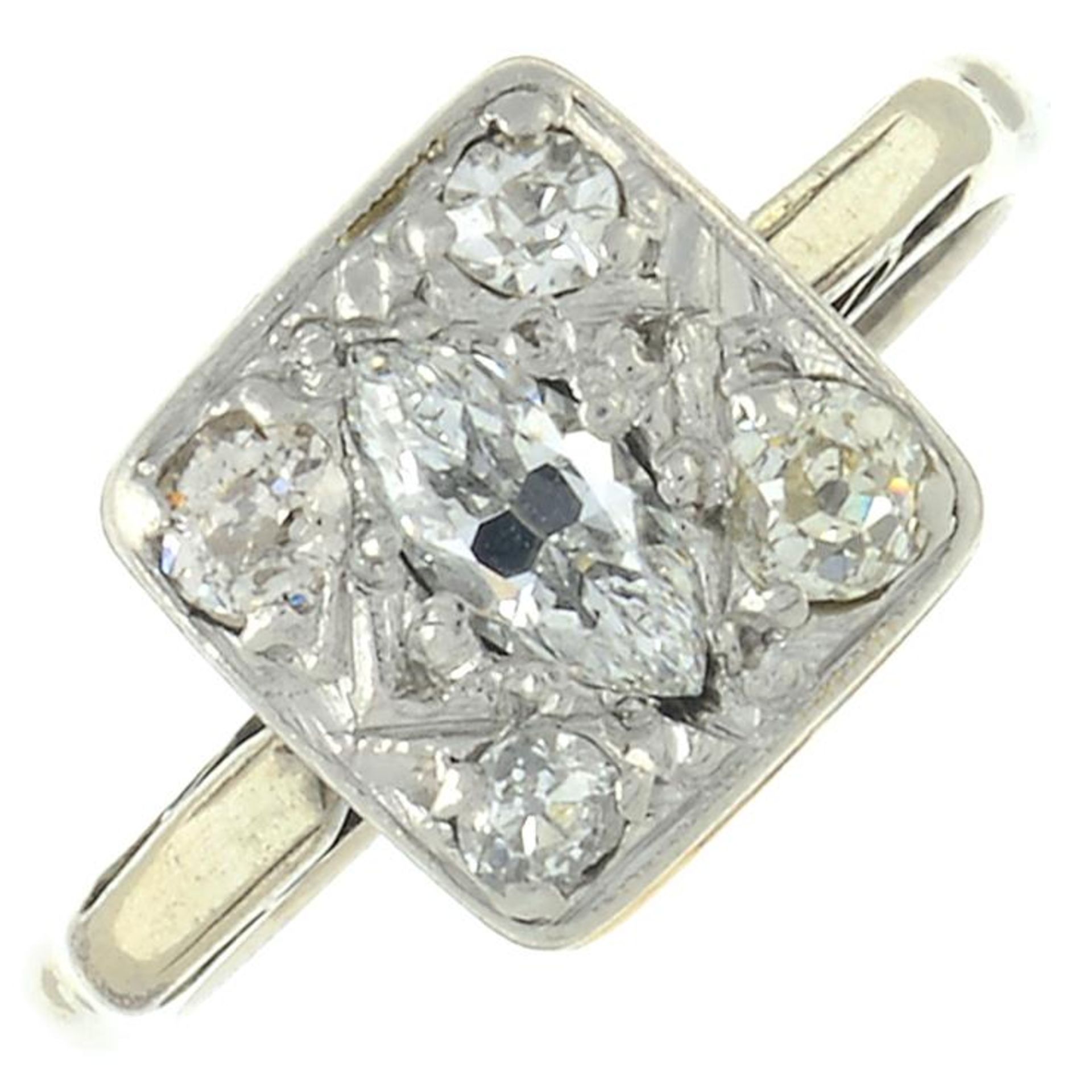 A vari-cut diamond cluster ring.Principal diamond estimated weight 0.20ct,