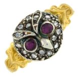 A ruby and diamond owl ring.Stamped 18ct.