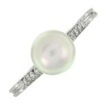 A split pearl and diamond ring.Ring size O1/2.