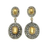A pair of citrine and diamond earrings.Stamped 585.