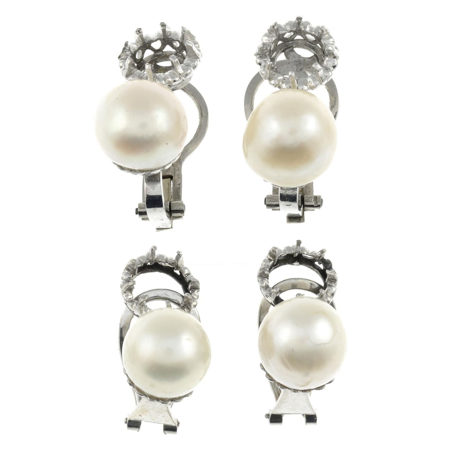 Three pairs of cultured , split and mabe pearl earring mounts.One pair stamped 750.