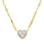 An 18ct gold diamond heart pendant, with chain.Estimated total diamond weight 0.40ct.