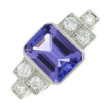 A tanzanite and diamond ring.Estimated total diamond weight 0.30ct.