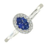 An 18ct gold sapphire and diamond cluster ring.Total sapphire weight 0.22ct.