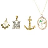 9ct gold cubic zirconia initial 'M' pendant,