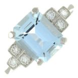 An aquamarine and diamond ring.Estimated total diamond weight 0.20ct.
