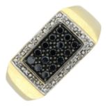 A 9ct gold diamond and black gem signet ring.Estimated total diamond weight 0.10ct.